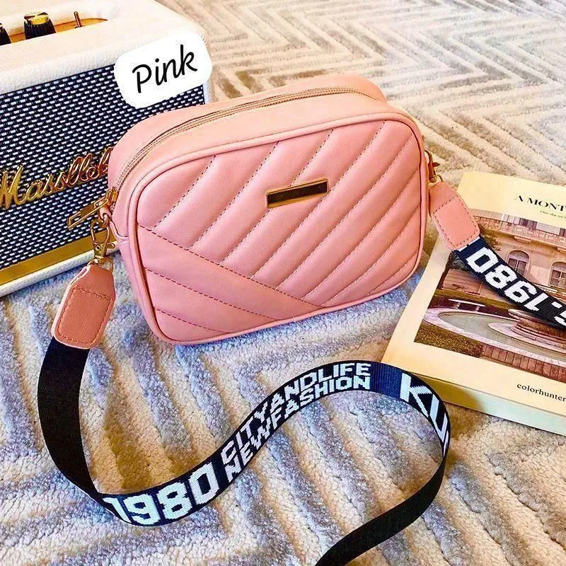 Buy Quilted Wide Strap Crossbody Bag - Pink online in Pakistan - Serivo Handbags
