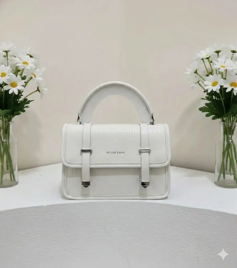 Serivo ribbed white handbag, studio photograph
