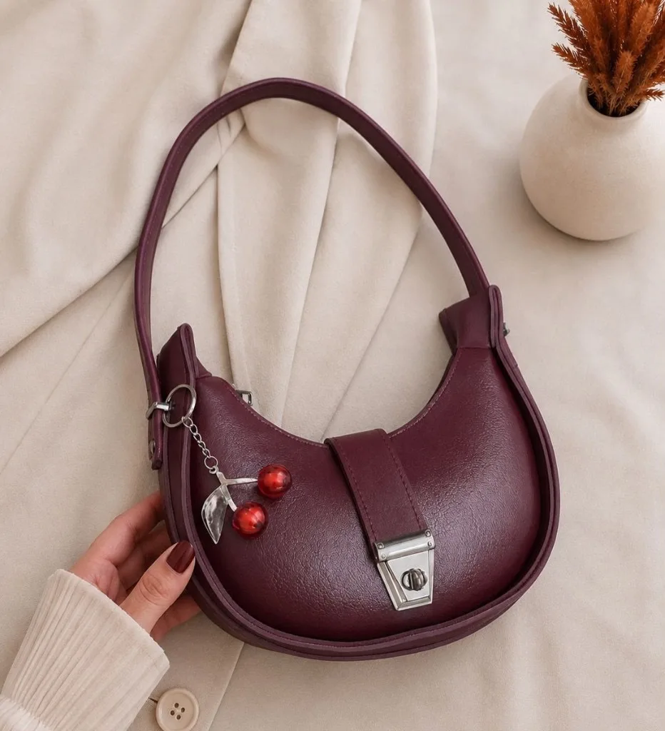 Buy Serivo Moon Bag Cherry Charm - Burgundy online in Pakistan - Serivo Handbags